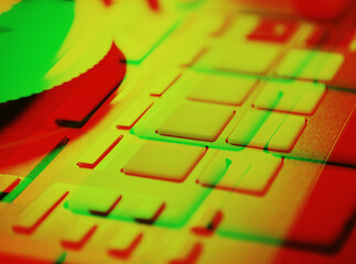 Midi controller for disc jockey in bright green neon lights.Hip hop dj sound mixer.Digital turntable player with push buttons and platter disc for playing musical tracks on party in nightclub.