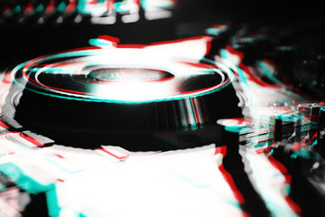 Dj midi controller with turntable and sound mixer edited with anaglyph 3D effect.Professional disc...