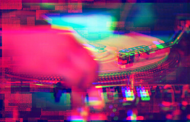 Hip hop dj plays on turntables edited in glitch style.Professional disc jockey playing music on party in night club.Retro turn table player and sound mixer devices on stage
