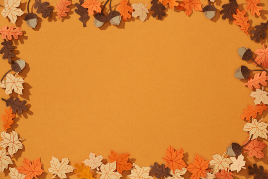 Autumn background, tree paper leaves, yellow backdrop,
