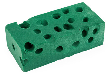 A green floral foam brick is used, insulated on a white background. Floral Sponge.