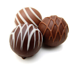 Chocolate candies collection. Beautiful Belgian truffles isolated on white background