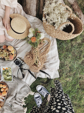 Retro picnic with fruits and flowers
