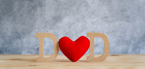 Objects on the table of Happy Fathers day holiday background concept.Word MOM text with red heart love on the modern beautiful grey backdrop at a home office desk. mock-up, border, banner, copy space.