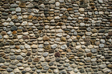 The wall is lined with stones