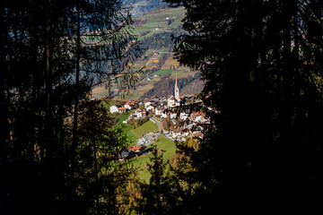 Landscape of a valley in south tyrol in the world natural heritage funes in the dolomites in autumn