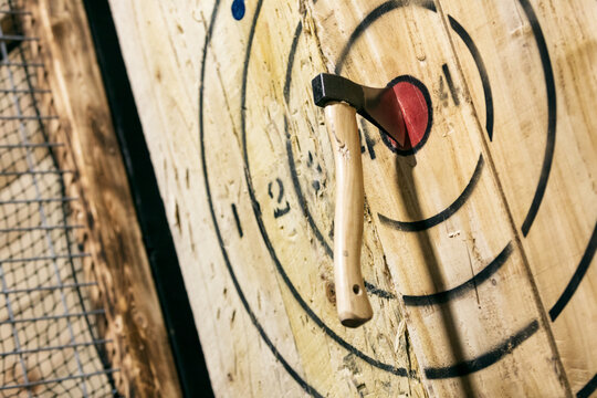 Hatchet In Bulllseye Of Target With Copyspace