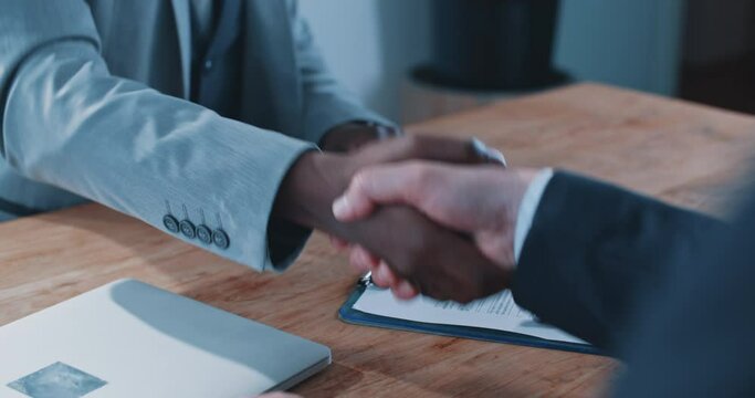 Multi-ethnic business deal