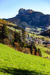 Landscape of a valley in south tyrol in the world natural heritage funes in the dolomites in autumn
