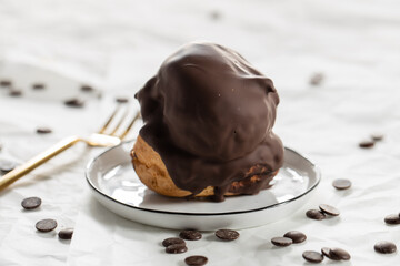 Dutch bossche bollen, bossche bollen cake, whipped cream, dutch ball of chocolate, dessert, delicious dessert with cappuccino