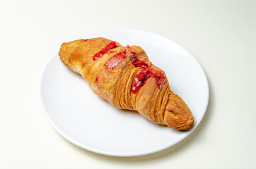 Croissants with strawberries and chocolate. High quality photo