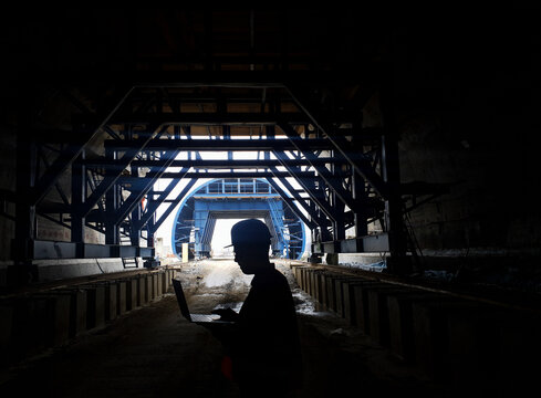 Industrial Engineer in an underconstructed tunnel