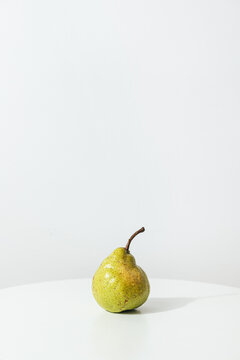 Still life of pear on white background