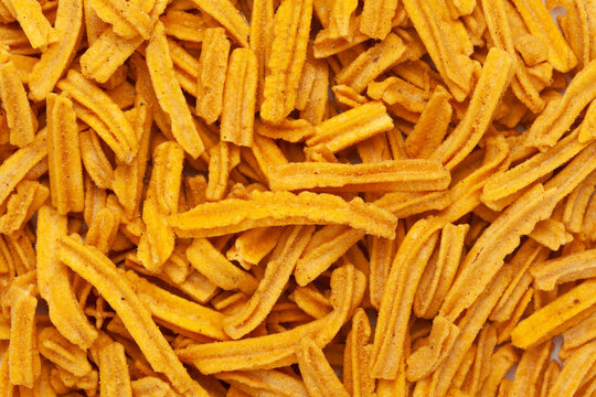 Close up of salted Soya Sticks Indian namkeen (snacks) Full-Frame Background. Top View