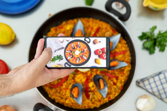 Taking a photo of a Spanish Paella