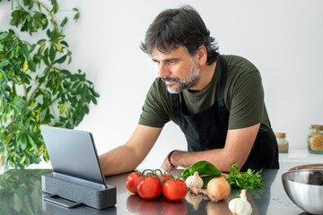 Cook using a tablet in the kitchen
