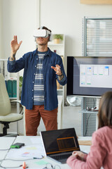 IT Developer Using VR in Office