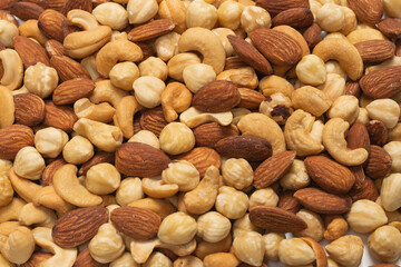 Mix of nuts isolated on white background. Top view.