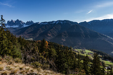 Landscape of a valley in south tyrol in the world natural heritage funes in the dolomites in autumn