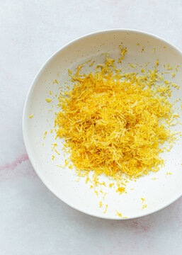 Lemon zest in ceramic bowl