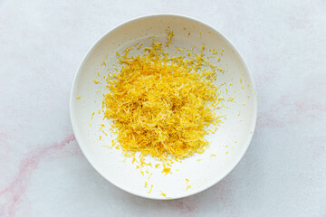 Lemon zest in ceramic bowl