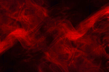 Fototapeta na wymiar Red steam on a black background.