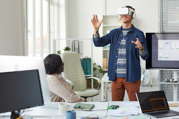IT Developer Using VR Technology in Office