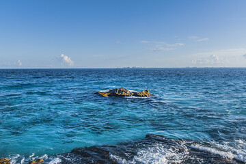 The beautiful nature of the island Isla Mujeres at sunset. Isla Mujeres, with its wonderful beaches, lies about 8 miles northeast of Cancun in the Caribbean Sea. Mexico.