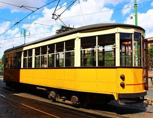 Fototapeta na wymiar Italy, Milan: Detail of Yellow Tram.