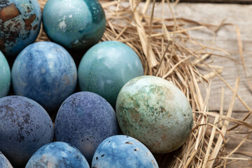 Easter background with Easter eggs. Beautiful blue painted Easter eggs