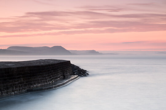 Harbour and hills at sunrise
