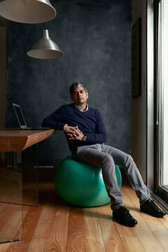Portrait of a young Indian Phd professor