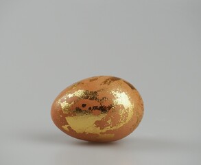Golden eggs  Gray background isolated