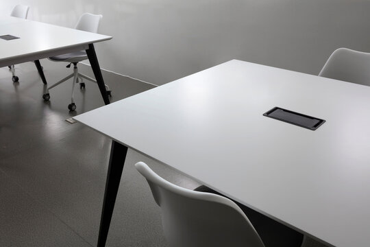Close up of high quality office desks and chairs, special composition background
