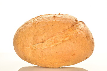 One loaf of delicious white bread, close-up, isolated on white.