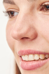 closeup of smile girl with white healthy teeth