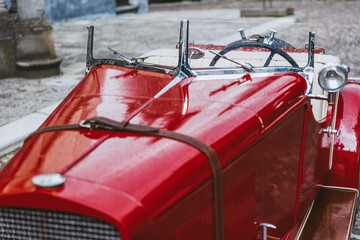 Restored lacquered car with old metal details