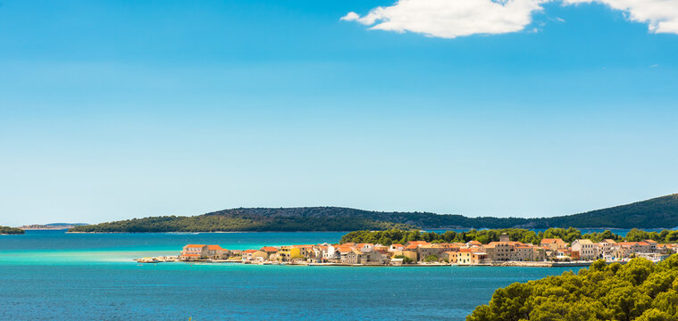 Sunny shore of the Adriatic sea near Brodarica coastline, Croatia