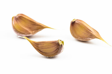 Seed of garlic are isolated on a white background.