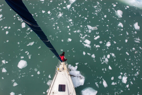 Sailboat Finding Its Way Through Icy Water