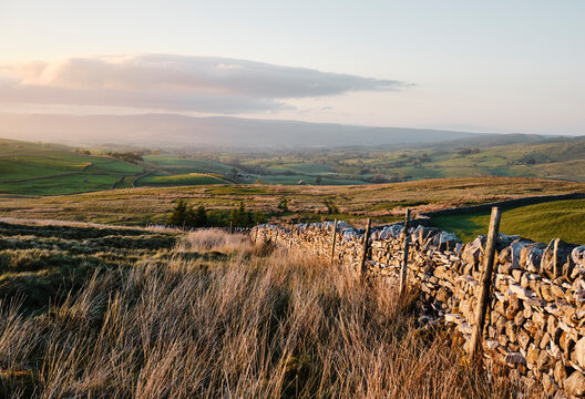 View to Kirkby Stephen at sunset. Wharton Fell, Cumbria, UK.