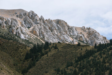 Aerial photography of basaltic mountains and clouds along the Yunnan-Tibet route