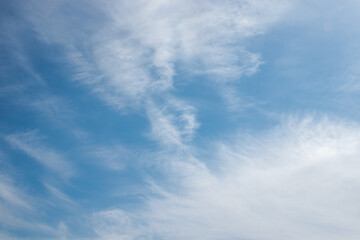 cold blue sky with white clouds