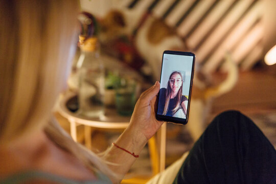 Anonymous Woman Video Chatting With Her Daughter