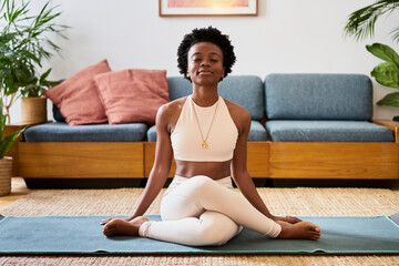 Woman meditating at home