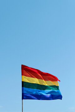 rainbow flag waving on the wind