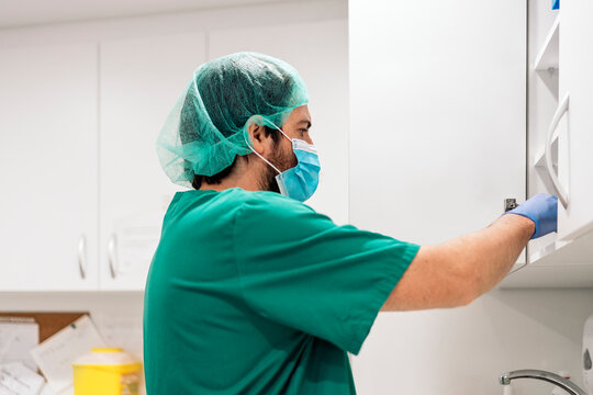 Male Doctor Working in Hospital