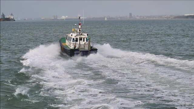 Harbourmaster patrol boat. Sea police marine checks within the port. Boat at speed. ABP Southampton