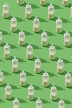 Vertical glass baby milk bottles pattern.