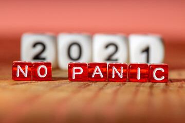 no panic message written on cubes against the background of 2021